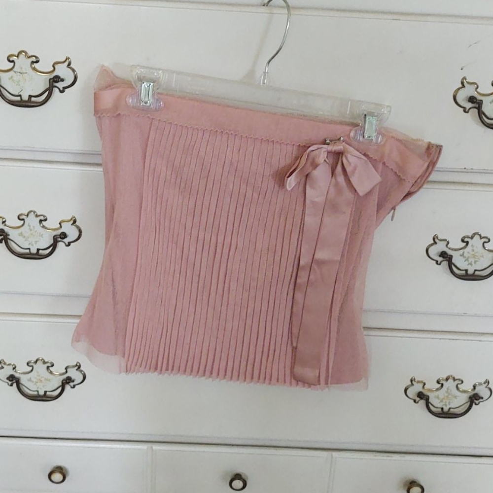 The limited strapless top